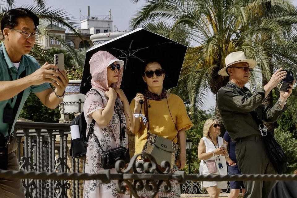 Highways baking at 70 deg Celsius signal a red-hot summer from China to the US