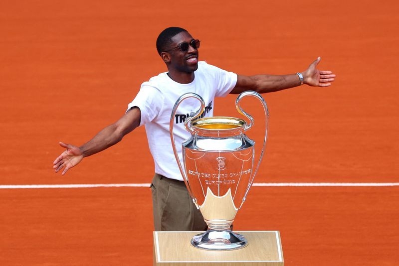 Tennis-Champions League trophy, Dembele get winners' welcome at French Open
