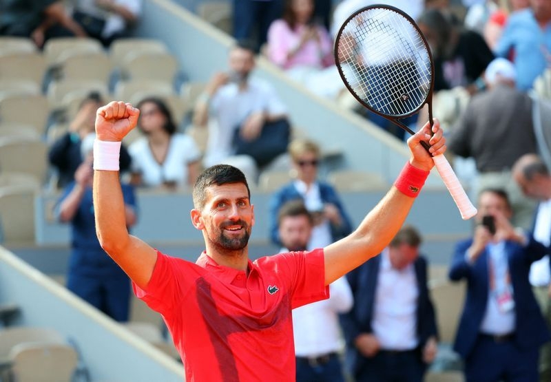 Tennis-Djokovic beats Norrie to join Nadal in French Open century club
