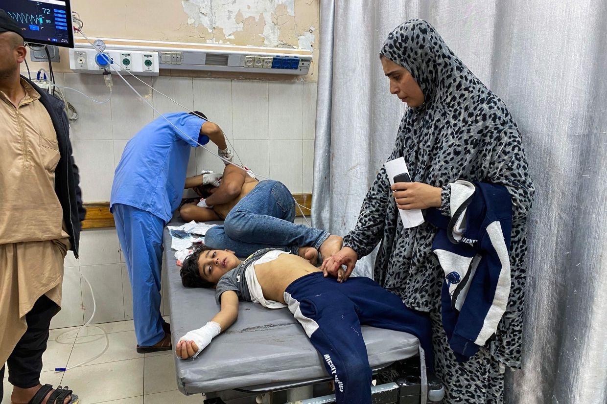 At least 27 Palestinians killed near Gaza aid site, medics say