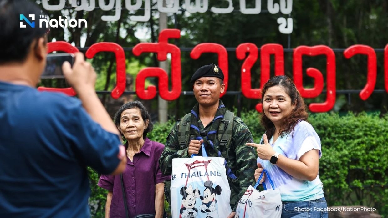 Thai tourists visit troops at temple on Cambodian border to show support amid rising tension