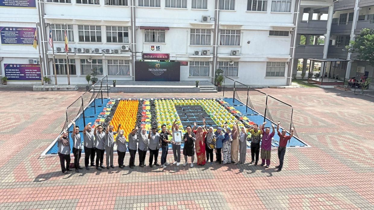 Sports-themed floor mural in Klang school sets record