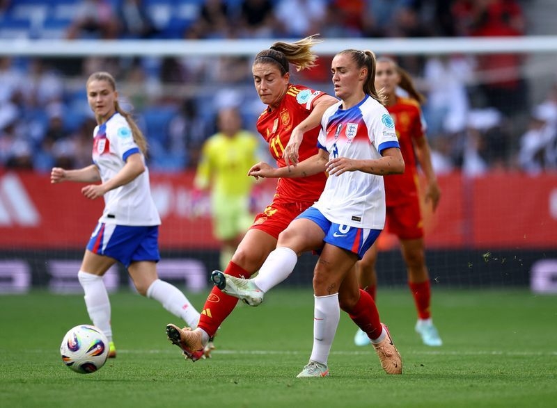 Soccer-Spain into last four of Women's Nations League after 2-1 win over England
