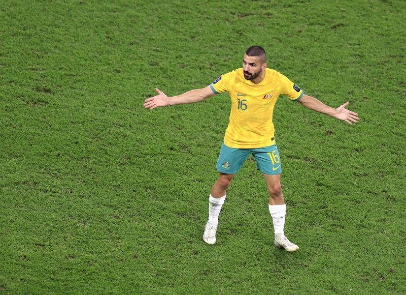 Soccer-Late Behich strike puts Australia on brink of World Cup
