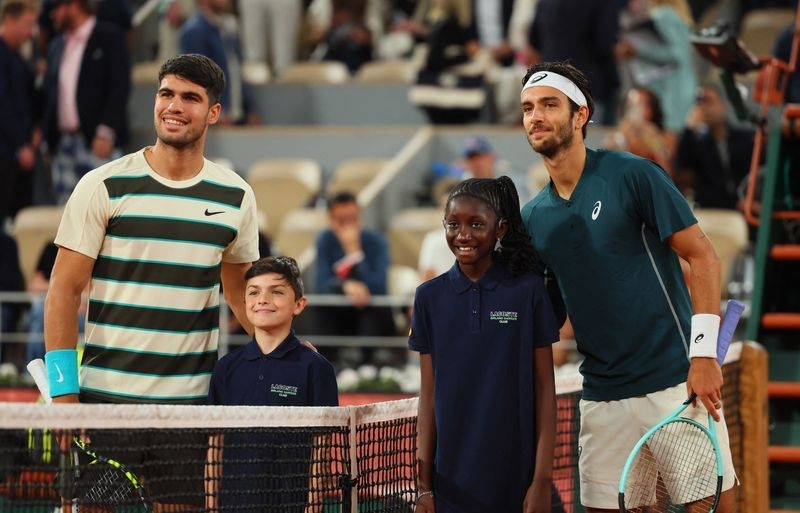 Tennis-Sole searching: Alcaraz pays homage to Nadal's footprint at Roland Garros