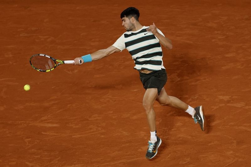 Tennis-Alcaraz sees off ailing Musetti for return to French Open final