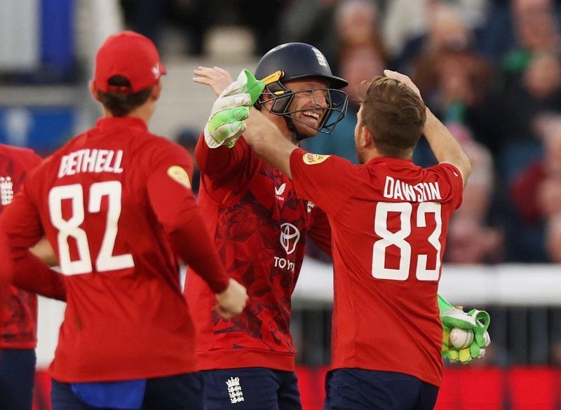 Cricket-Buttler and Dawson shine as England beat West Indies in T20 opener