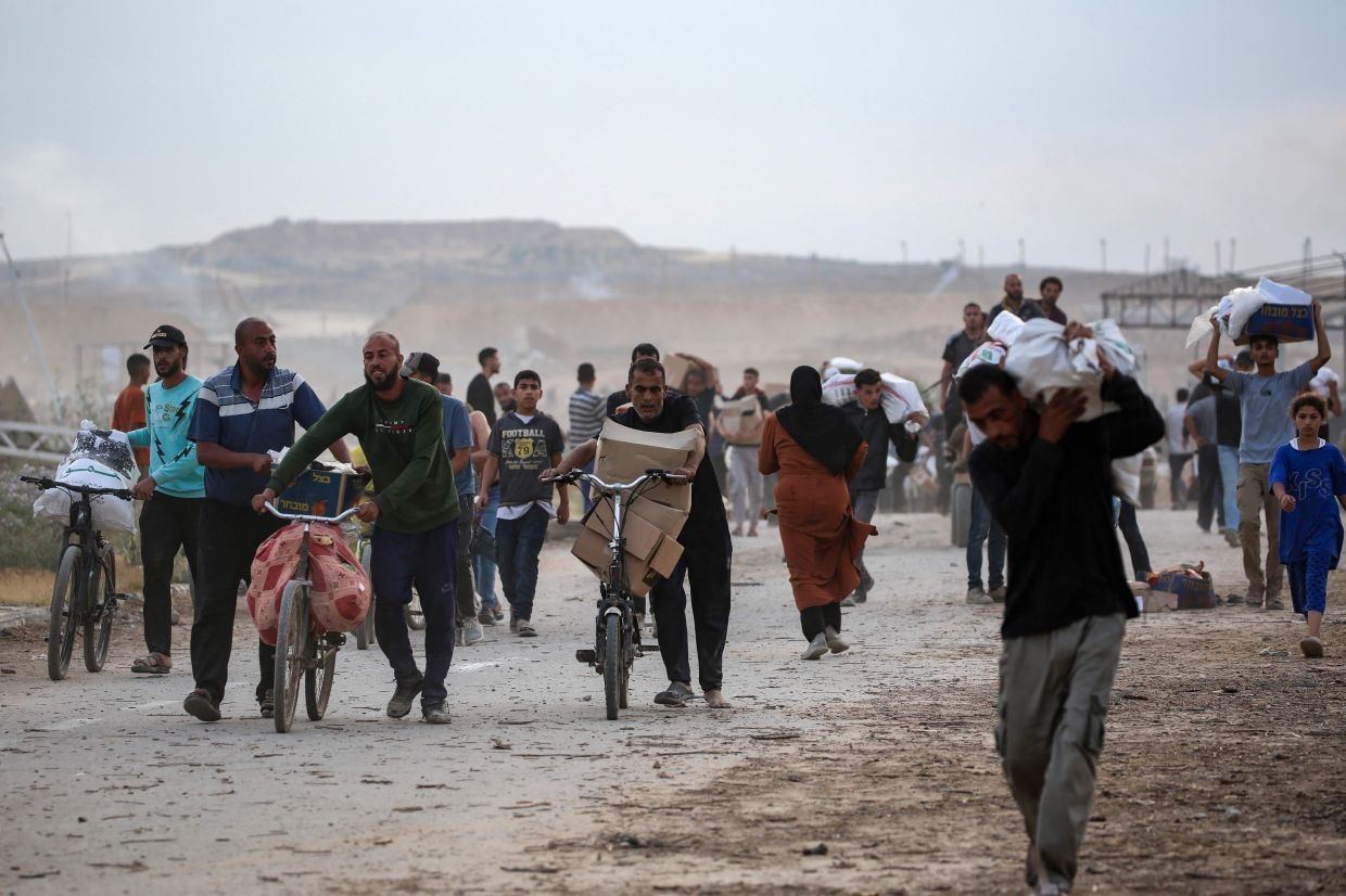 Civilians in Gaza face heavy attacks while seeking food at aid centres, says UN agency