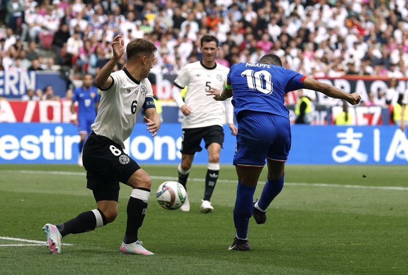 Soccer-Mbappe and Olise earn France third place in Nations League