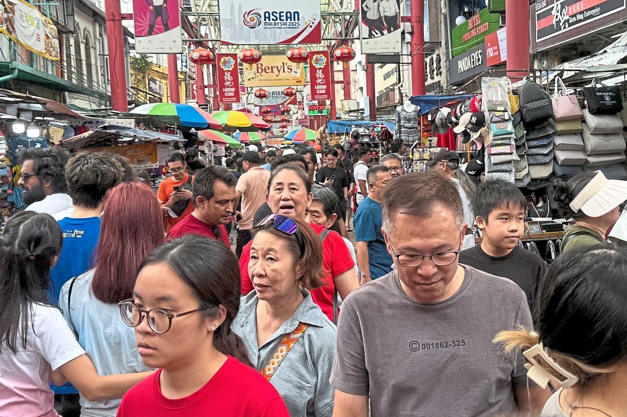 Malaysians flock to KL over double holiday weekend