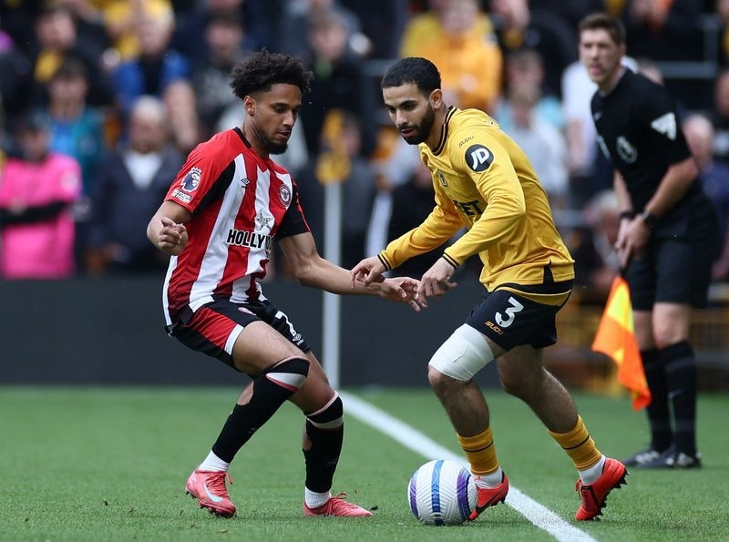 Soccer-Man City sign Ait-Nouri from Wolves on five-year deal