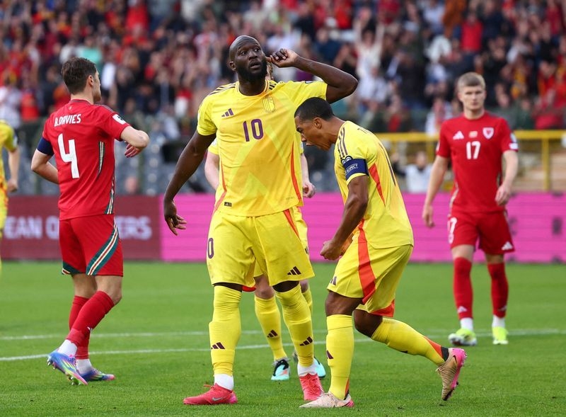 Soccer-De Bruyne to the rescue as Belgium hold off gallant Welsh fightback