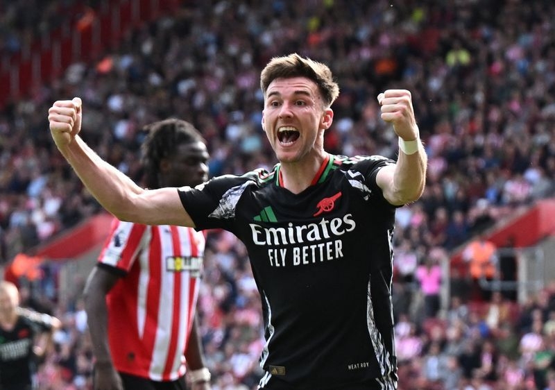 Soccer-Celtic sign Tierney from Arsenal on five-year deal
