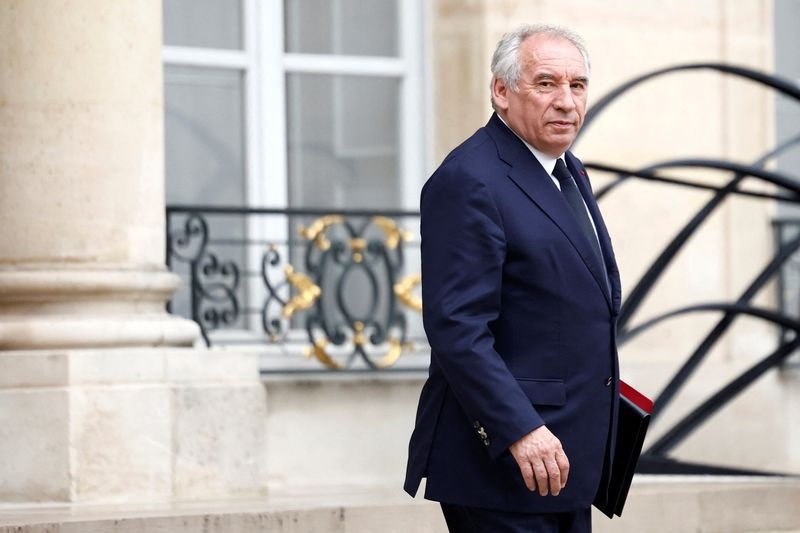 France to test adding security gates at schools after aide stabbed to death, PM says