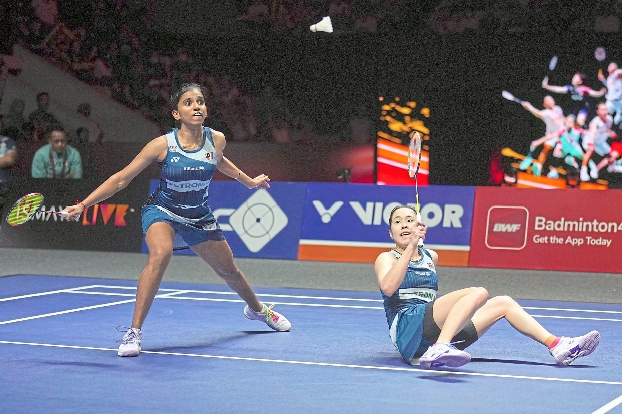 Rosman stays put to produce women's doubles champs