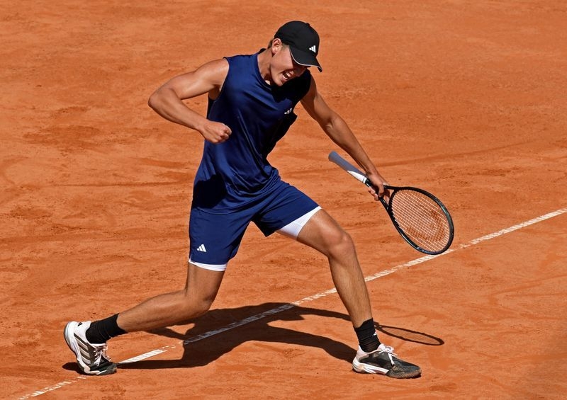Tennis-Engel claims upset win in first professional match on grass in Stuttgart