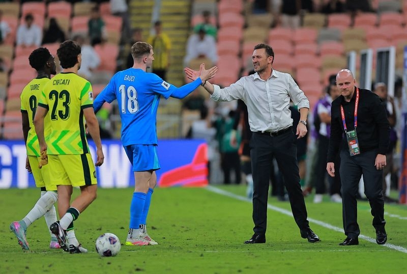 Soccer-Part one complete as Popovic's Australia lock up World Cup berth
