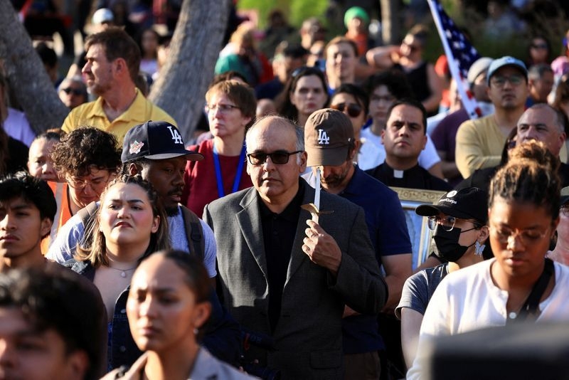 US cities brace for more protests as parts of Los Angeles placed under curfew