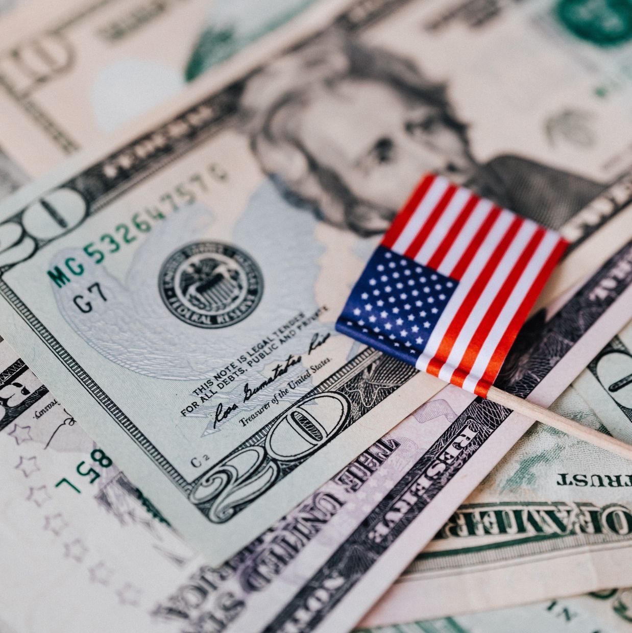 US dollar hits 7-week lows, focus on rate outlook, trade talks