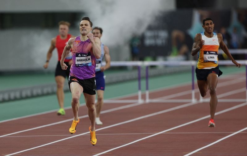 Athletics-Norway's Warholm shatters own world best time in 300m hurdles