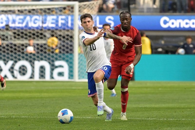 Soccer-Pulisic says questions about his commitment to national team 'way out of line'