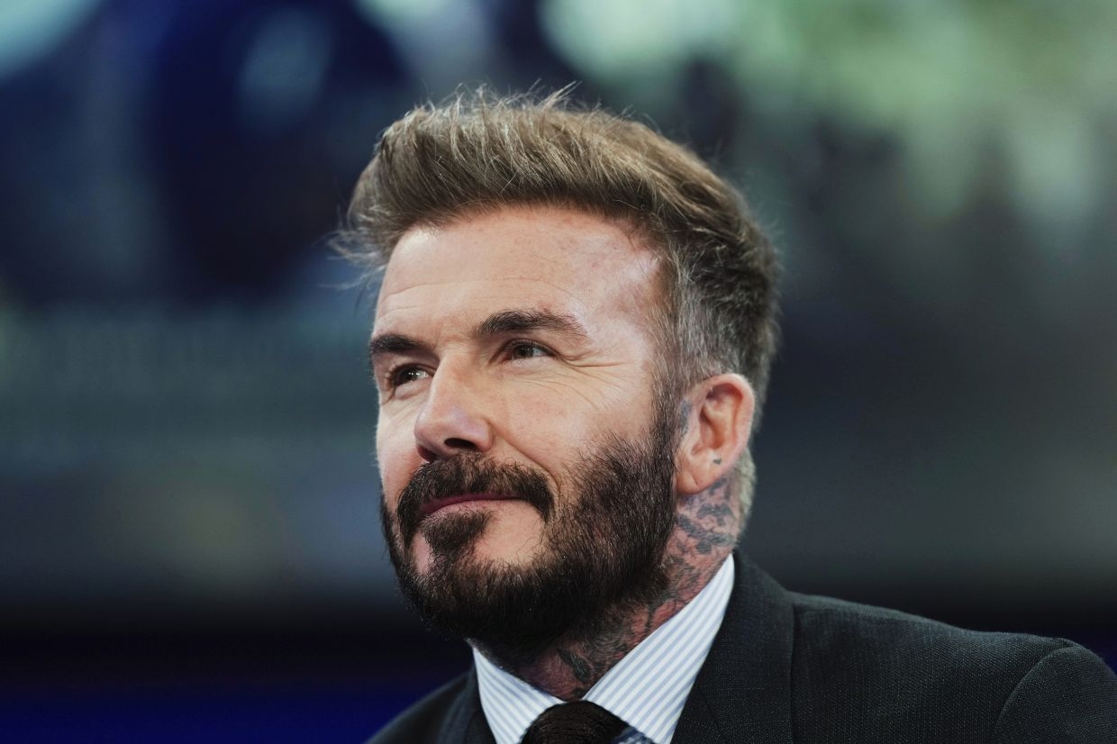 Arise Sir David! Football legend Beckham knighted
