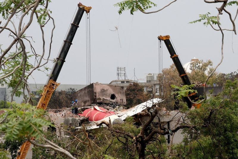 U.S. officials survey Air India crash site, families continue to wait for bodies