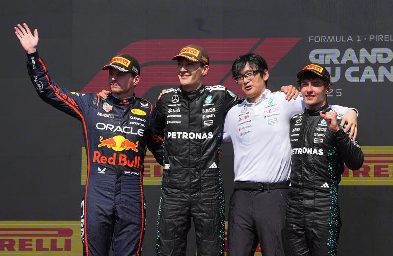 Motor racing-Russell wins in Canada after McLarens collide, Norris out