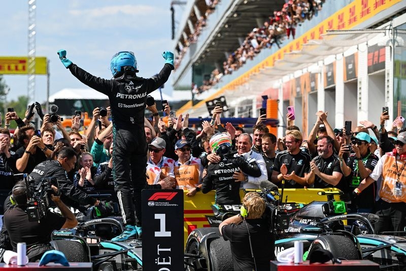 Motor racing-Winner Russell driving better than ever but title a long shot
