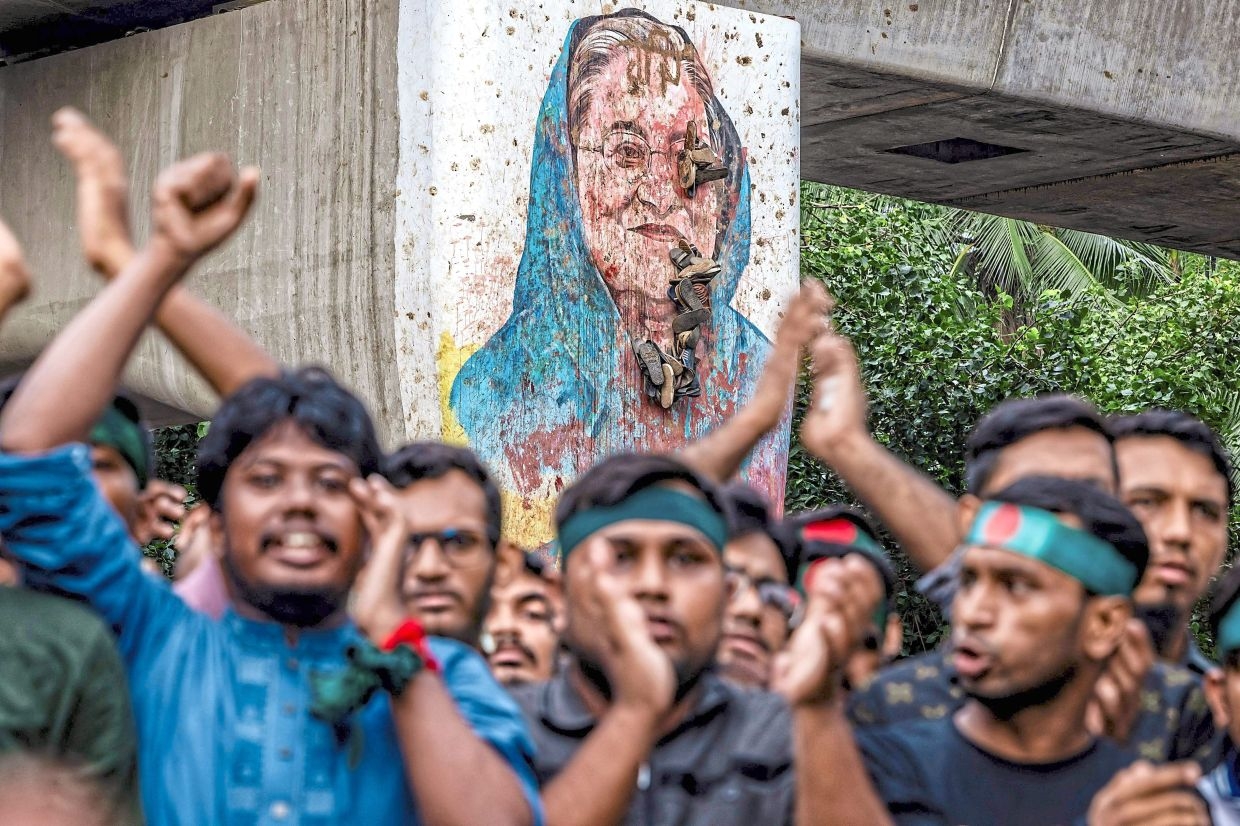 Bangladesh orders fugitive ex-leader Hasina to return to face trial