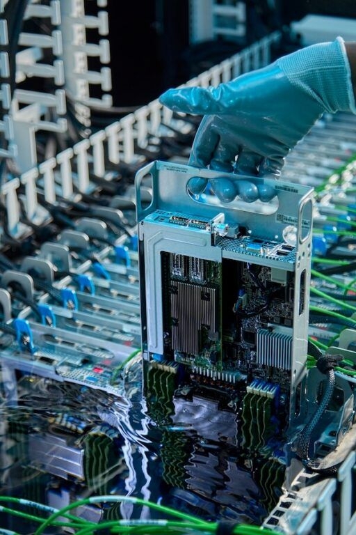 Submerging servers in liquid helps data centres cut energy use