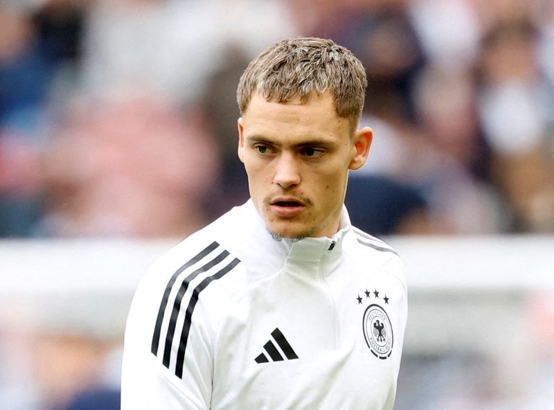 Soccer-Liverpool shatter club transfer record to sign Germany midfielder Wirtz