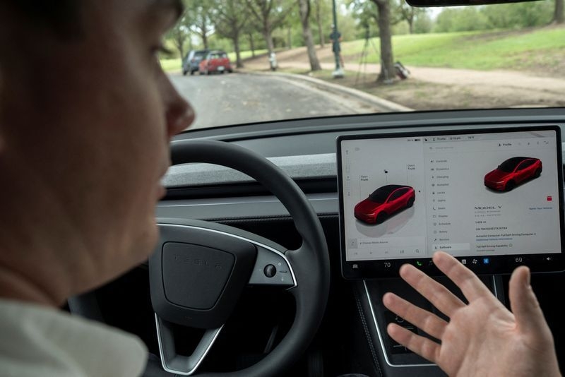 Tesla invites select few to Texas robotaxi trial with front seat safety monitors
