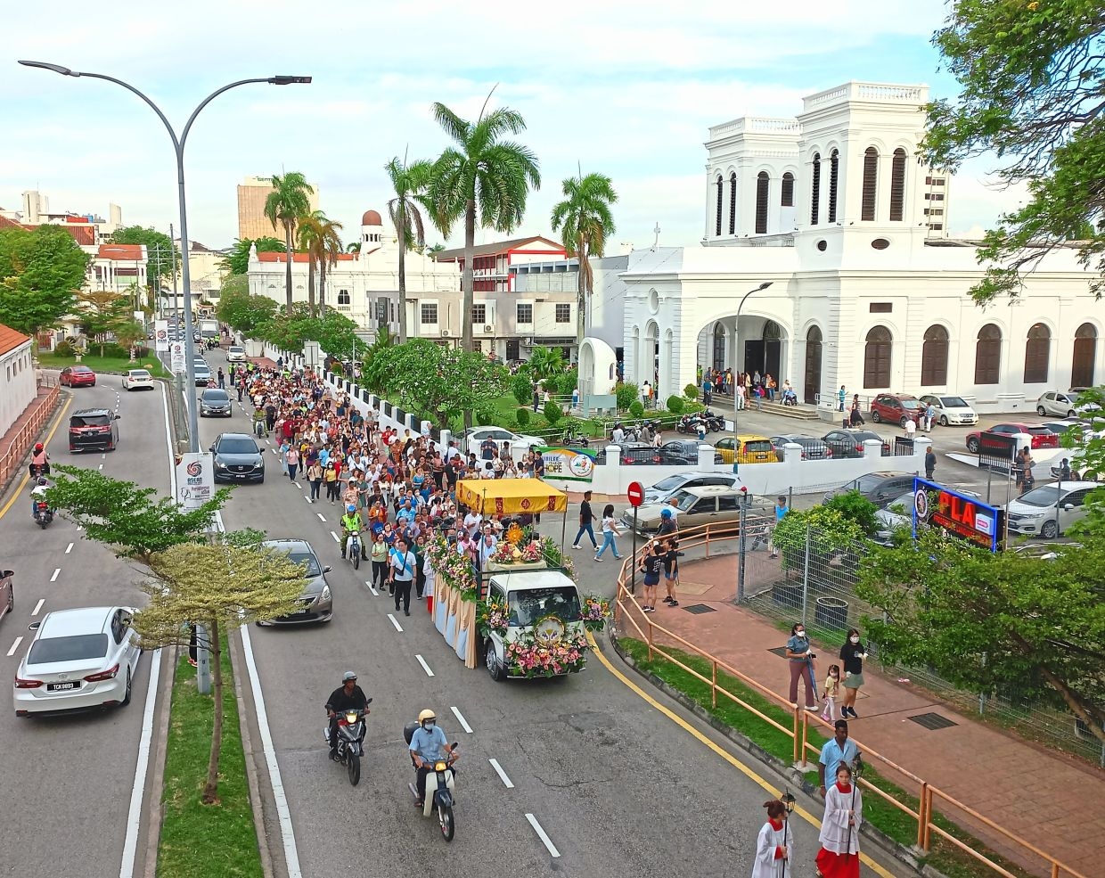Corpus Christi procession unites Penang's parishes
