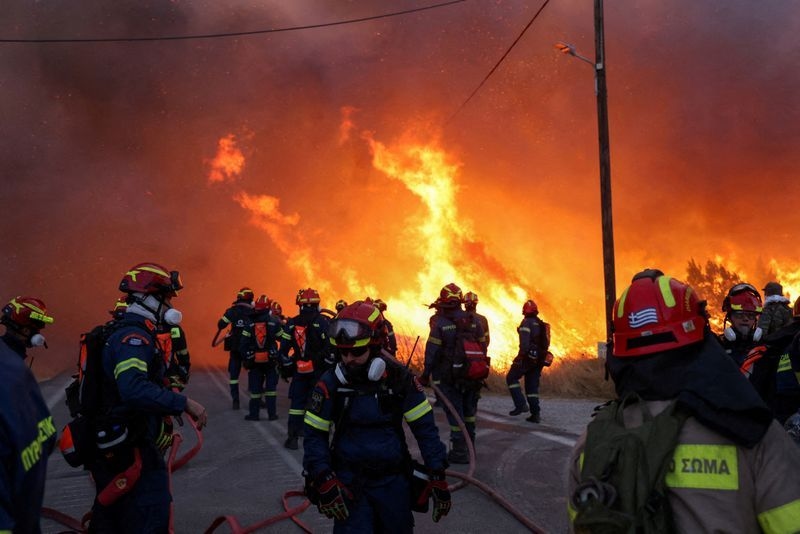 Firefighters battle wildfires on Greece's Chios island for second day