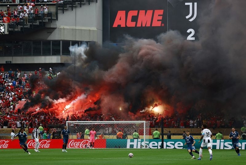 Soccer-South American fans light up Club World Cup, while some venues fall flat