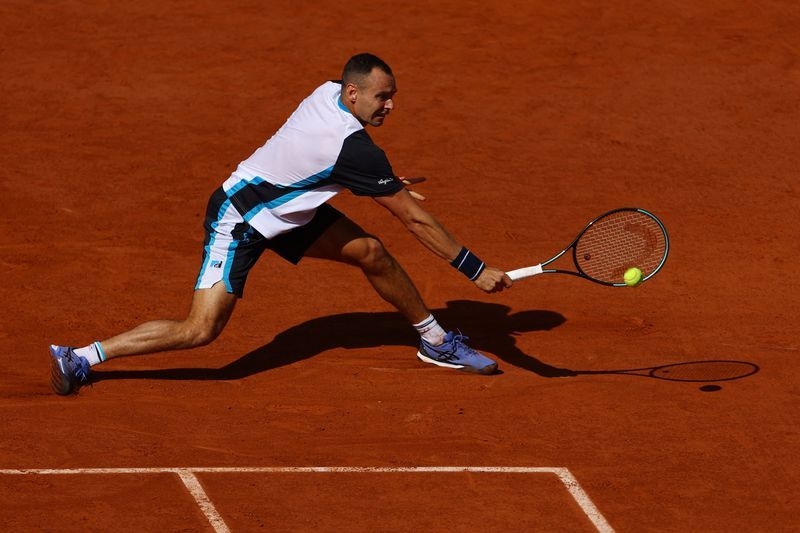 Tennis-Safiullin upsets Muller, Moutet through in Mallorca