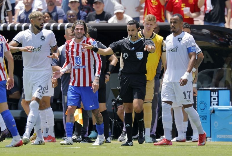 Soccer-Botafogo deserve respect for progressing from 'group of death', says Freitas
