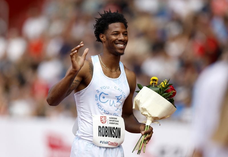 Athletics-Robinson overcomes embarrassing wardrobe malfunction to win Ostrava 400 hurdles