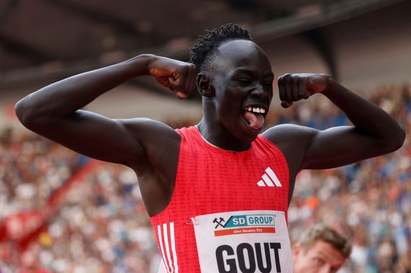 Athletics-Australian teen sensation Gout betters his own 200m national record