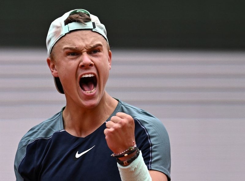 Tennis-Rune hopes to turn smashed rackets into charity gold