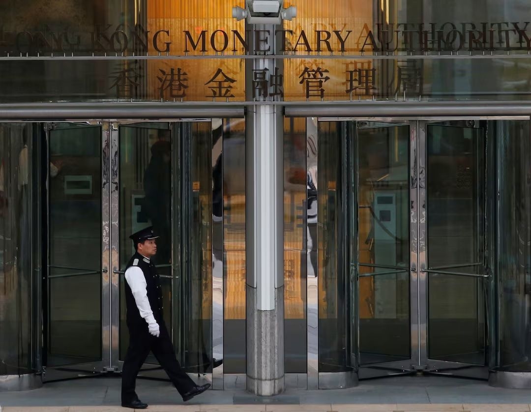 Hong Kong's de facto central bank intervenes as Hong Kong dollar hits weak end of trading range