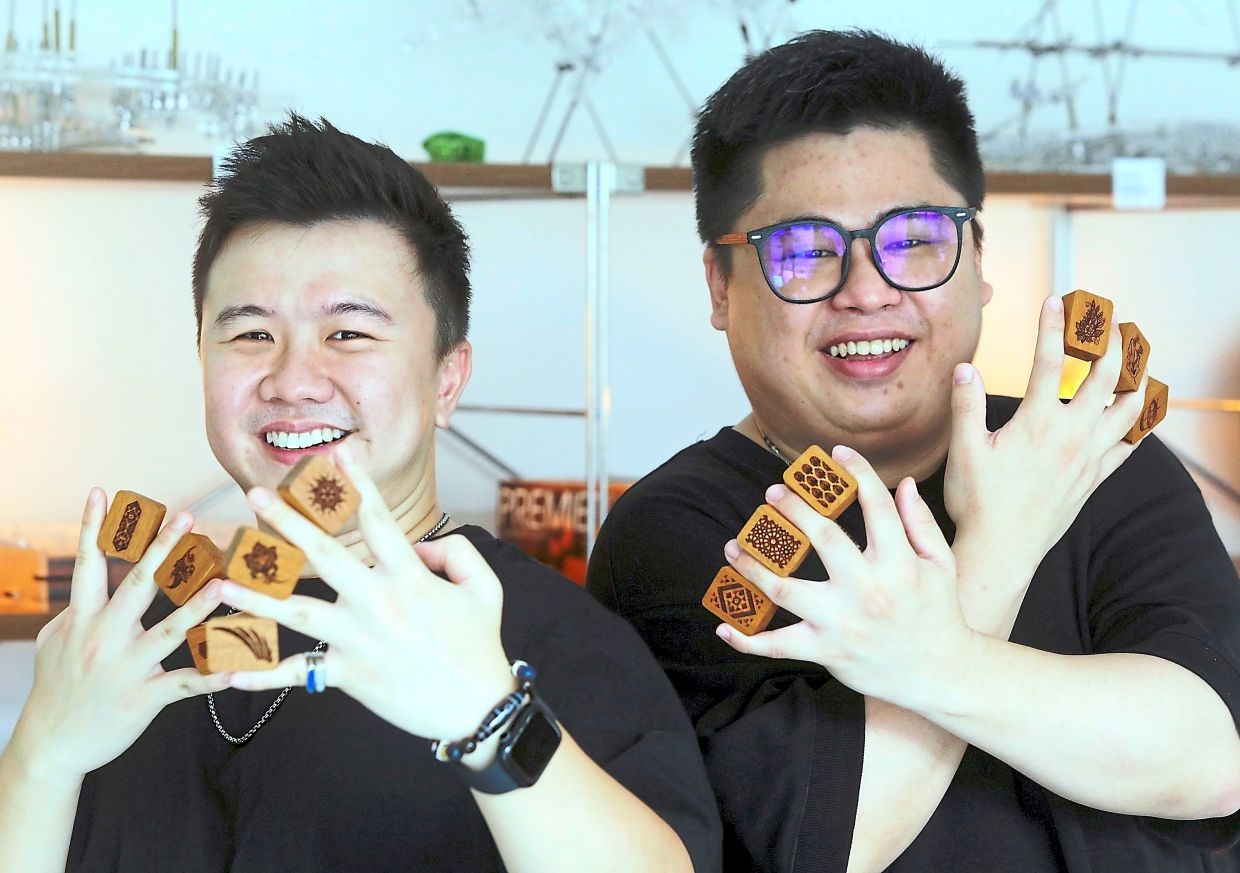 Malaysian pals create mahjong set with local elements like kuih lapis and satay