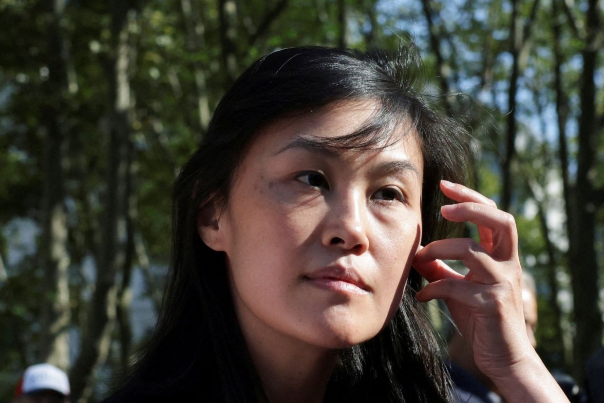Ex-New York official facing China agent charge indicted for kickbacks