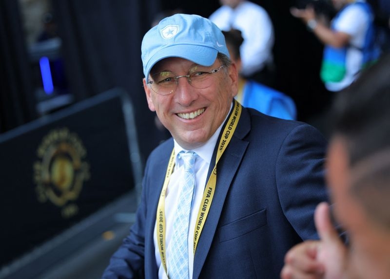 Soccer-Lyon owner Textor to step back from club management