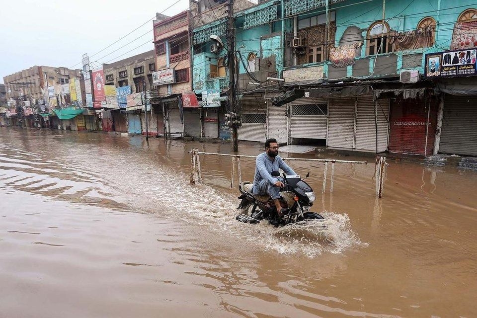 Pakistan flash floods and heavy rain kill 32, including 16 children