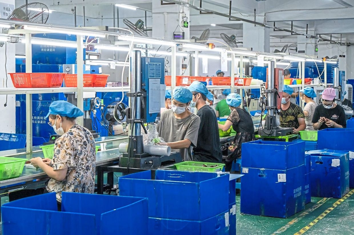 Factory activity decline eases after trade truce