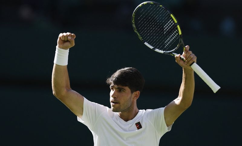 Tennis-Alcaraz survives Fognini scare to begin Wimbledon defence with win