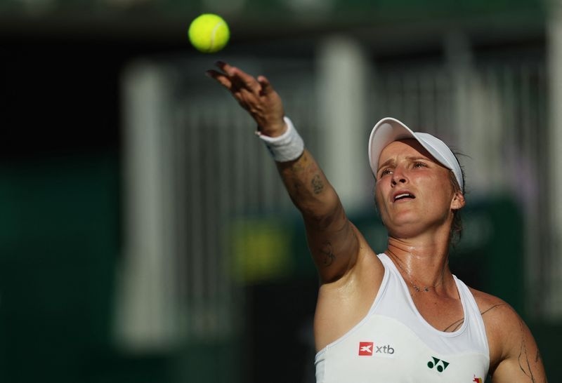 Tennis-Pain free Vondrousova getting old magic back on grass
