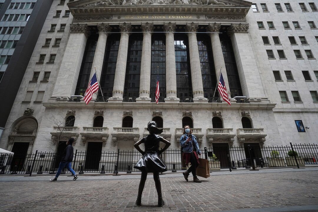 S&P 500, Nasdaq close at record highs, cap best quarter in over a year
